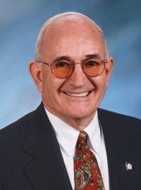 MADIGAN, Roger Allen