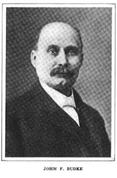 BUDKE, John F.
