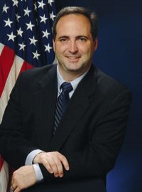 MCILHINNEY Jr., Charles T.
