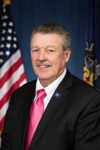 BREWSTER, James R.